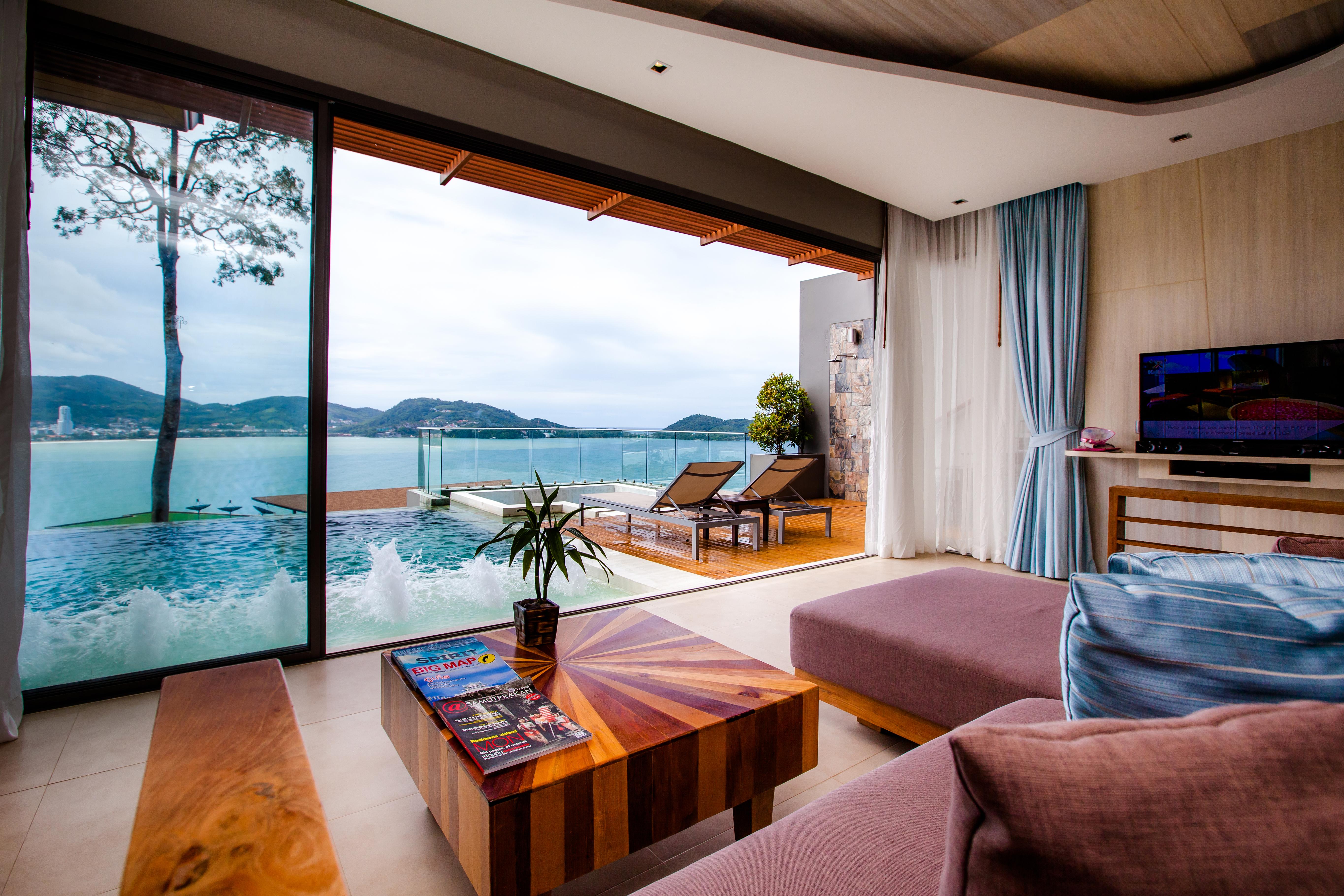 Kalima Resort And Spa Patong Kültér fotó A living room in a villa at the resort