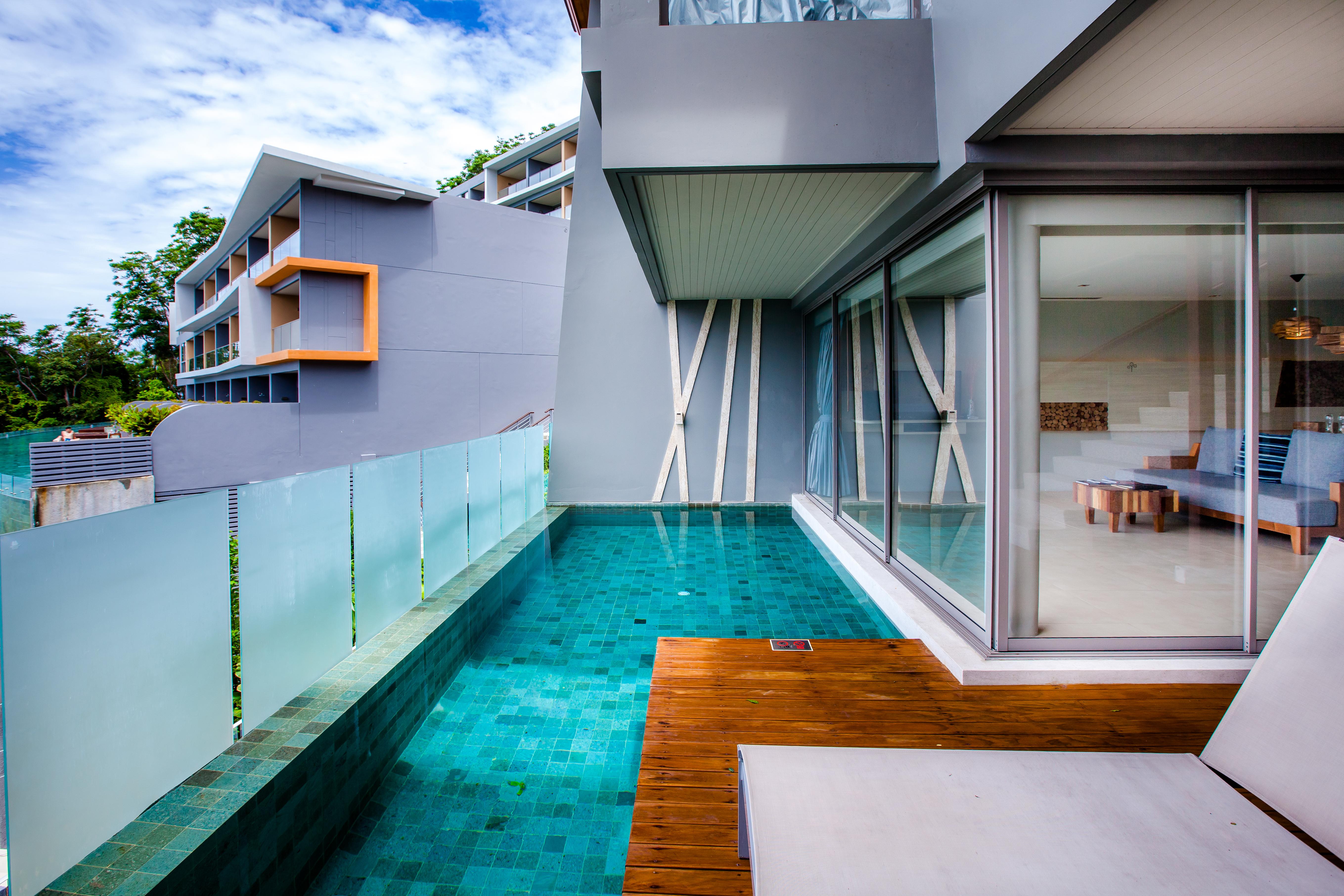 Kalima Resort And Spa Patong Kültér fotó A private pool at a hotel in Phuket, Thailand