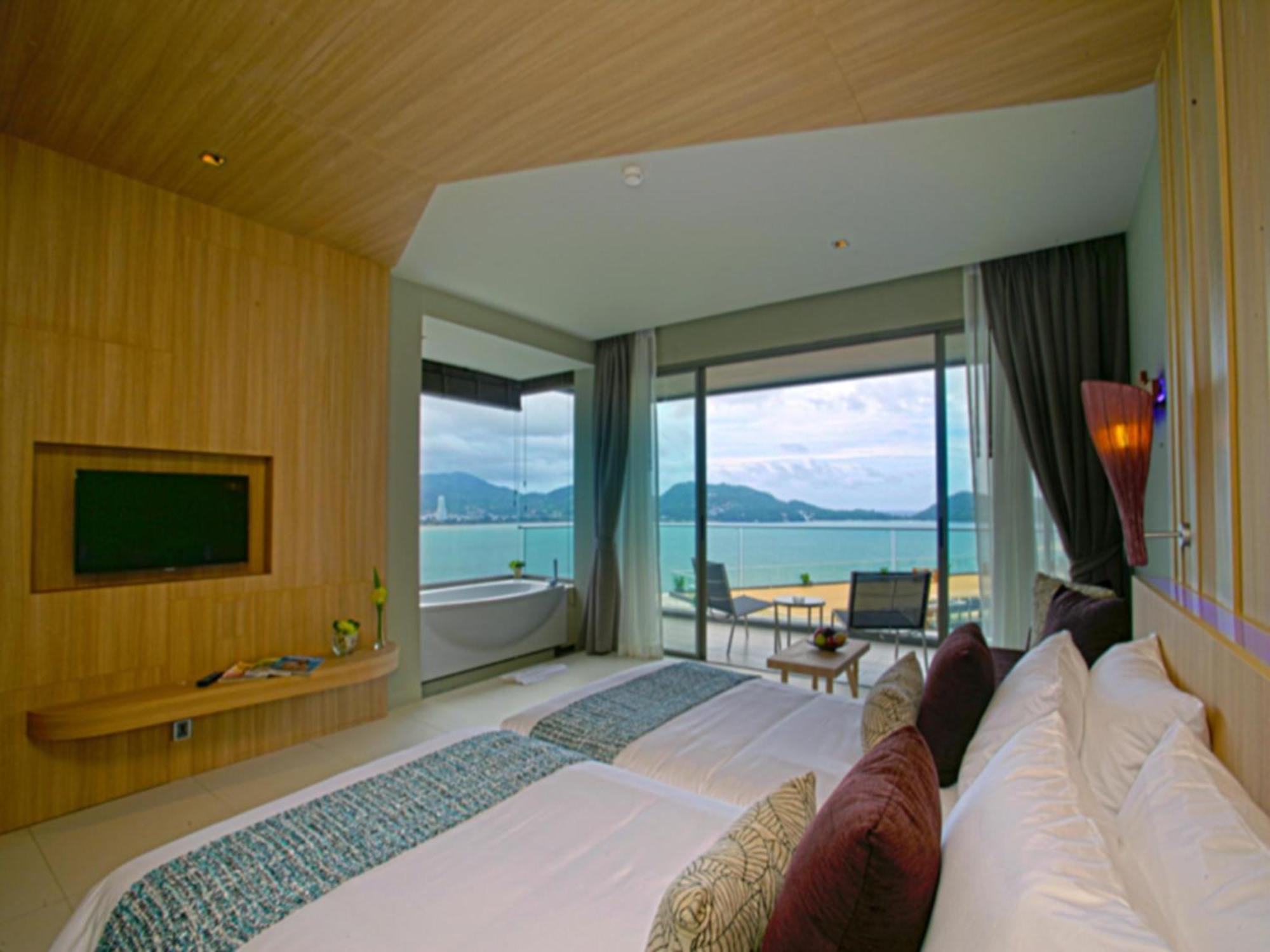 Kalima Resort And Spa Patong Szoba fotó A bedroom at the hotel